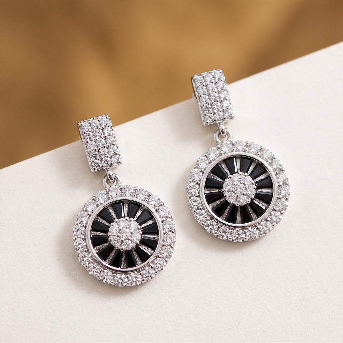 Silver Crystal Medallion Drop Earrings with Blue Stones
