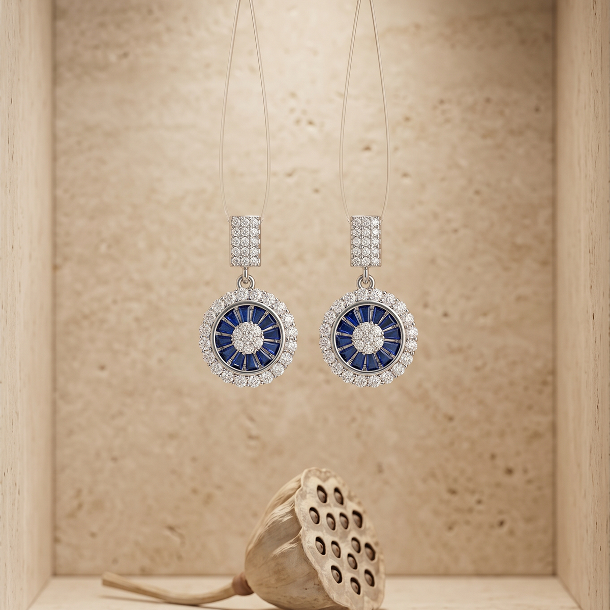 Silver Crystal Medallion Drop Earrings with Blue Stones